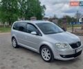 Серый Фольксваген Туран, объемом двигателя 1.97 л и пробегом 186 тыс. км за 8750 $, фото 1 на Automoto.ua