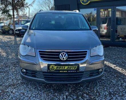 Серый Фольксваген Туран, объемом двигателя 1.4 л и пробегом 242 тыс. км за 7000 $, фото 1 на Automoto.ua