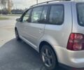 Фольксваген Туран 2007 в Лубнах на Automoto.ua Серый Фольксваген Туран, объемом двигателя 1.6 л и пробегом 199 тыс. км за 7699 $, фото 5 на Automoto.ua