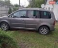 Сірий Фольксваген Туран, об'ємом двигуна 1.4 л та пробігом 250 тис. км за 6500 $, фото 4 на Automoto.ua