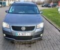 Серый Фольксваген Туран, объемом двигателя 1.4 л и пробегом 277 тыс. км за 6300 $, фото 2 на Automoto.ua