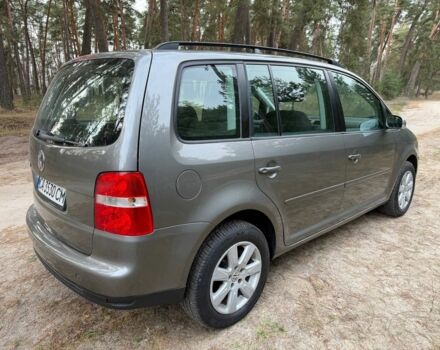 Серый Фольксваген Туран, объемом двигателя 1.6 л и пробегом 246 тыс. км за 5950 $, фото 2 на Automoto.ua