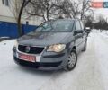 Серый Фольксваген Туран, объемом двигателя 1.6 л и пробегом 250 тыс. км за 7100 $, фото 1 на Automoto.ua