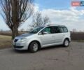 Серый Фольксваген Туран, объемом двигателя 1.9 л и пробегом 299 тыс. км за 6000 $, фото 1 на Automoto.ua