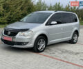 Серый Фольксваген Туран, объемом двигателя 1.9 л и пробегом 263 тыс. км за 7400 $, фото 1 на Automoto.ua