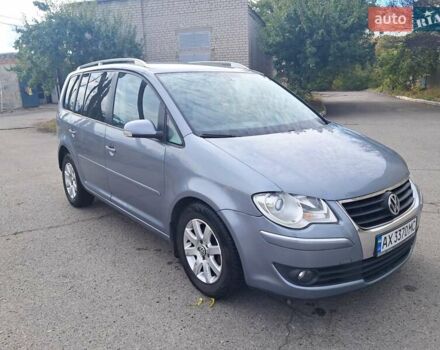 Серый Фольксваген Туран, объемом двигателя 1.4 л и пробегом 209 тыс. км за 6500 $, фото 3 на Automoto.ua