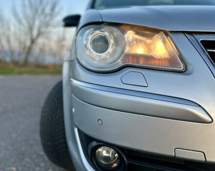 Сірий Фольксваген Туран, об'ємом двигуна 1.4 л та пробігом 248 тис. км за 7500 $, фото 4 на Automoto.ua