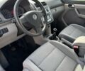 Фольксваген Туран 2007 в Лубнах на Automoto.ua Серый Фольксваген Туран, объемом двигателя 1.6 л и пробегом 199 тыс. км за 7699 $, фото 8 на Automoto.ua