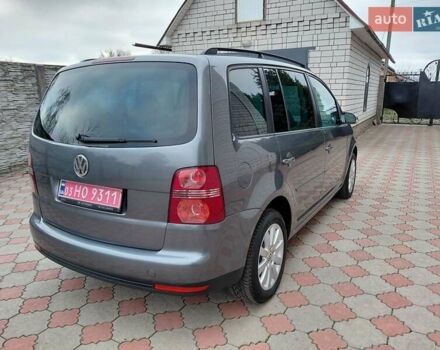 Серый Фольксваген Туран, объемом двигателя 1.6 л и пробегом 196 тыс. км за 7499 $, фото 3 на Automoto.ua