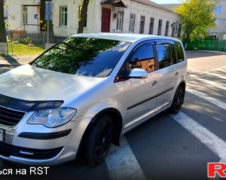 Серый Фольксваген Туран, объемом двигателя 1.4 л и пробегом 214 тыс. км за 5100 $, фото 1 на Automoto.ua