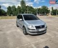 Сірий Фольксваген Туран, об'ємом двигуна 1.4 л та пробігом 206 тис. км за 6900 $, фото 1 на Automoto.ua