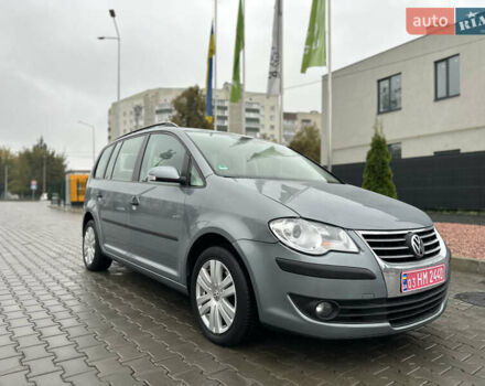 Серый Фольксваген Туран, объемом двигателя 1.4 л и пробегом 240 тыс. км за 6800 $, фото 2 на Automoto.ua