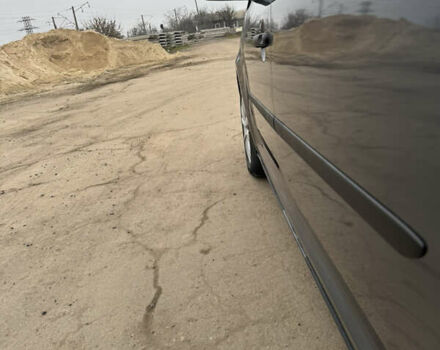 Сірий Фольксваген Туран, об'ємом двигуна 1.4 л та пробігом 185 тис. км за 7500 $, фото 5 на Automoto.ua