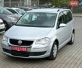 Серый Фольксваген Туран, объемом двигателя 1.4 л и пробегом 180 тыс. км за 7300 $, фото 1 на Automoto.ua