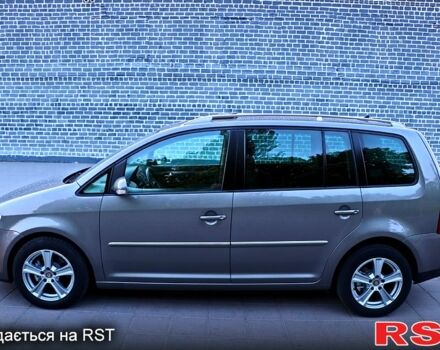Серый Фольксваген Туран, объемом двигателя 1.4 л и пробегом 260 тыс. км за 8888 $, фото 1 на Automoto.ua