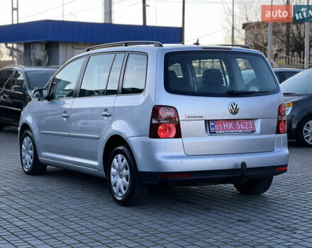Серый Фольксваген Туран, объемом двигателя 1.4 л и пробегом 175 тыс. км за 7500 $, фото 3 на Automoto.ua