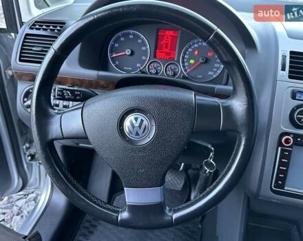 Серый Фольксваген Туран, объемом двигателя 1.4 л и пробегом 142 тыс. км за 8650 $, фото 49 на Automoto.ua