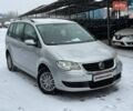 Серый Фольксваген Туран, объемом двигателя 1.4 л и пробегом 215 тыс. км за 7500 $, фото 1 на Automoto.ua