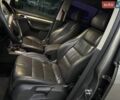 Серый Фольксваген Туран, объемом двигателя 1.97 л и пробегом 350 тыс. км за 6850 $, фото 1 на Automoto.ua