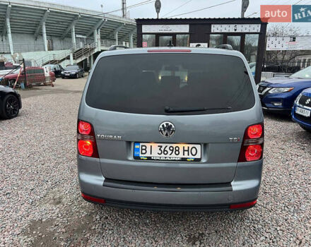 Серый Фольксваген Туран, объемом двигателя 1.4 л и пробегом 189 тыс. км за 7700 $, фото 4 на Automoto.ua