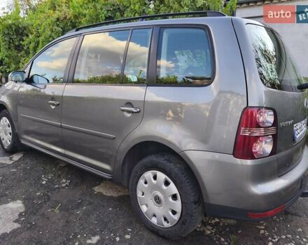 Серый Фольксваген Туран, объемом двигателя 1.39 л и пробегом 235 тыс. км за 8550 $, фото 2 на Automoto.ua