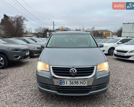 Серый Фольксваген Туран, объемом двигателя 1.4 л и пробегом 189 тыс. км за 7700 $, фото 1 на Automoto.ua