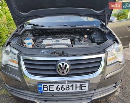 Серый Фольксваген Туран, объемом двигателя 1.39 л и пробегом 235 тыс. км за 8550 $, фото 19 на Automoto.ua