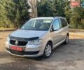 Сірий Фольксваген Туран, об'ємом двигуна 1.6 л та пробігом 220 тис. км за 6299 $, фото 1 на Automoto.ua