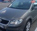 Серый Фольксваген Туран, объемом двигателя 1.9 л и пробегом 236 тыс. км за 7800 $, фото 1 на Automoto.ua