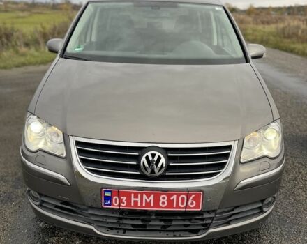 Серый Фольксваген Туран, объемом двигателя 1.4 л и пробегом 205 тыс. км за 6900 $, фото 2 на Automoto.ua