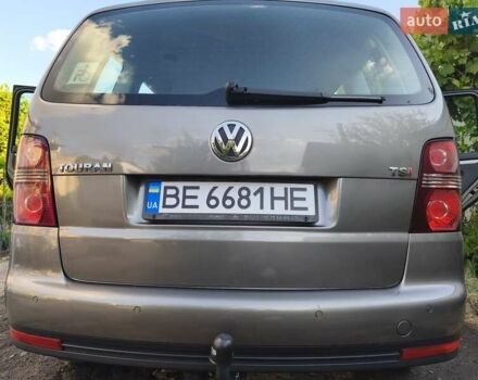 Серый Фольксваген Туран, объемом двигателя 1.39 л и пробегом 235 тыс. км за 8550 $, фото 1 на Automoto.ua