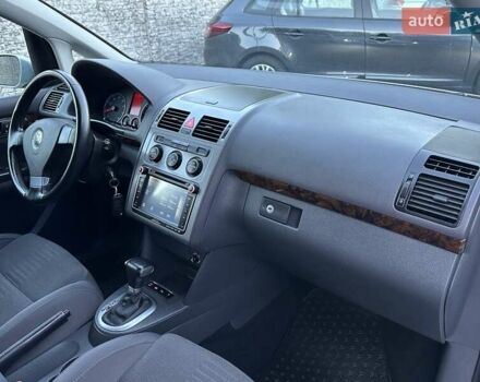 Серый Фольксваген Туран, объемом двигателя 1.4 л и пробегом 142 тыс. км за 8650 $, фото 88 на Automoto.ua