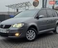Серый Фольксваген Туран, объемом двигателя 1.4 л и пробегом 223 тыс. км за 5999 $, фото 1 на Automoto.ua
