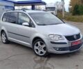 Сірий Фольксваген Туран, об'ємом двигуна 1.4 л та пробігом 227 тис. км за 5999 $, фото 1 на Automoto.ua
