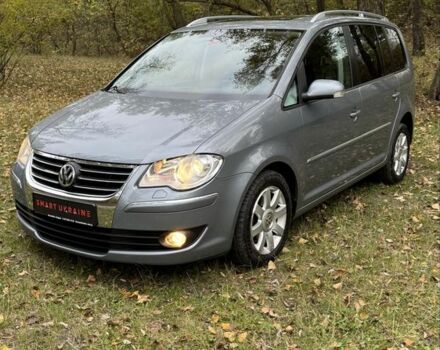 Серый Фольксваген Туран, объемом двигателя 1.4 л и пробегом 187 тыс. км за 8250 $, фото 1 на Automoto.ua