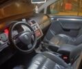 Сірий Фольксваген Туран, об'ємом двигуна 1.97 л та пробігом 325 тис. км за 6900 $, фото 1 на Automoto.ua
