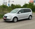 Серый Фольксваген Туран, объемом двигателя 1.4 л и пробегом 187 тыс. км за 7650 $, фото 1 на Automoto.ua