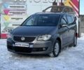 Сірий Фольксваген Туран, об'ємом двигуна 1.4 л та пробігом 253 тис. км за 7499 $, фото 1 на Automoto.ua