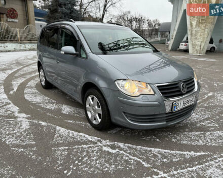 Сірий Фольксваген Туран, об'ємом двигуна 1.4 л та пробігом 189 тис. км за 7400 $, фото 2 на Automoto.ua