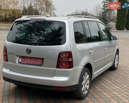 Сірий Фольксваген Туран, об'ємом двигуна 1.4 л та пробігом 187 тис. км за 7600 $, фото 4 на Automoto.ua