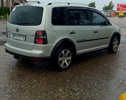 Серый Фольксваген Туран, объемом двигателя 1.4 л и пробегом 317 тыс. км за 7500 $, фото 1 на Automoto.ua