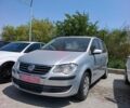 Сірий Фольксваген Туран, об'ємом двигуна 1.6 л та пробігом 220 тис. км за 6999 $, фото 1 на Automoto.ua