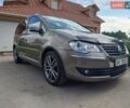 Сірий Фольксваген Туран, об'ємом двигуна 1.4 л та пробігом 207 тис. км за 8000 $, фото 1 на Automoto.ua