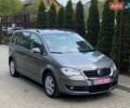 Серый Фольксваген Туран, объемом двигателя 1.4 л и пробегом 223 тыс. км за 7300 $, фото 1 на Automoto.ua