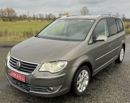 Сірий Фольксваген Туран, об'ємом двигуна 1.4 л та пробігом 205 тис. км за 6950 $, фото 1 на Automoto.ua