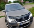 Серый Фольксваген Туран, объемом двигателя 1.4 л и пробегом 300 тыс. км за 8500 $, фото 1 на Automoto.ua