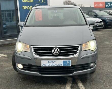 Серый Фольксваген Туран, объемом двигателя 1.39 л и пробегом 263 тыс. км за 6290 $, фото 2 на Automoto.ua
