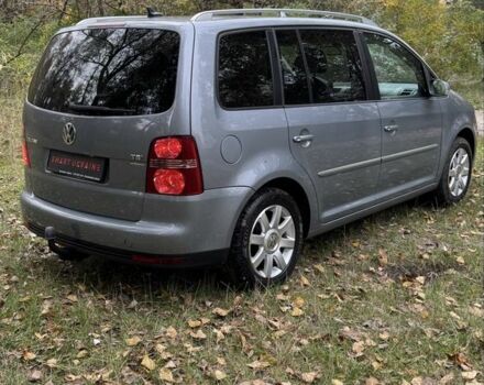 Серый Фольксваген Туран, объемом двигателя 1.4 л и пробегом 187 тыс. км за 8250 $, фото 2 на Automoto.ua