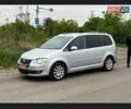 Серый Фольксваген Туран, объемом двигателя 1.4 л и пробегом 189 тыс. км за 7900 $, фото 1 на Automoto.ua