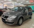 Серый Фольксваген Туран, объемом двигателя 1.4 л и пробегом 238 тыс. км за 7900 $, фото 1 на Automoto.ua